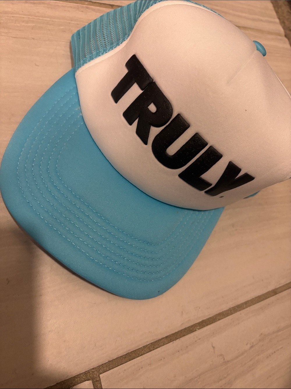 TRULY Light Blue and White Mesh Trucker Hat with Black Logo